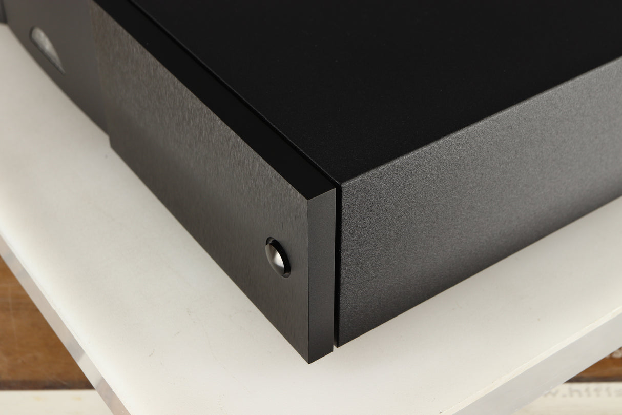 Front right corner of a used Naim NAP250 DR Power Amplifier in a black finish
