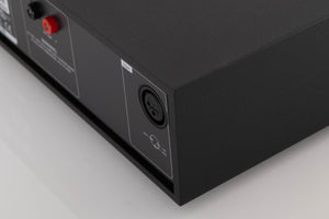Rear left corner of a used Naim NAP250 DR Power Amplifier in a Black finish