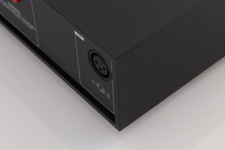 Rear left corner of a used Naim NAP250 DR Power Amplifier in a Black finish