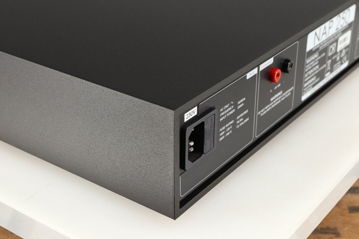 Rear right corner of a used Naim NAP250 DR Power Amplifier in a black finish 