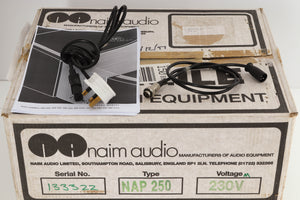 Box for a used Naim NAP250 Power Amplifier in a black finish showing marks on top showing Manual, SNAIC4 and Mains Cable