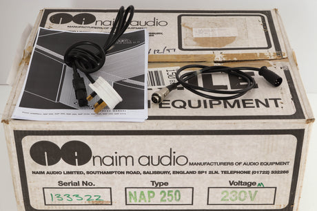 Box for a used Naim NAP250 Power Amplifier in a black finish showing marks on top showing Manual, SNAIC4 and Mains Cable