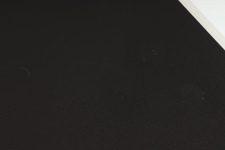 Close up of a used Naim NAP250 Power Amplifier in a black finish showing marks on top