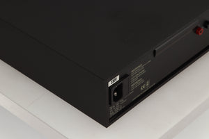 Rear right corner of a used Naim NAP250 Power Amplifier in a black finish