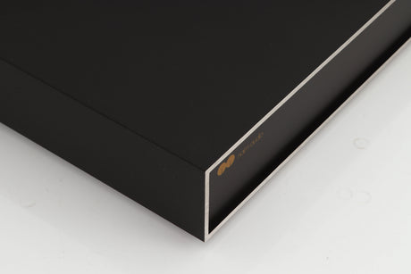 Front left corner of a used Naim NAP250 Power Amplifier in a black finish
