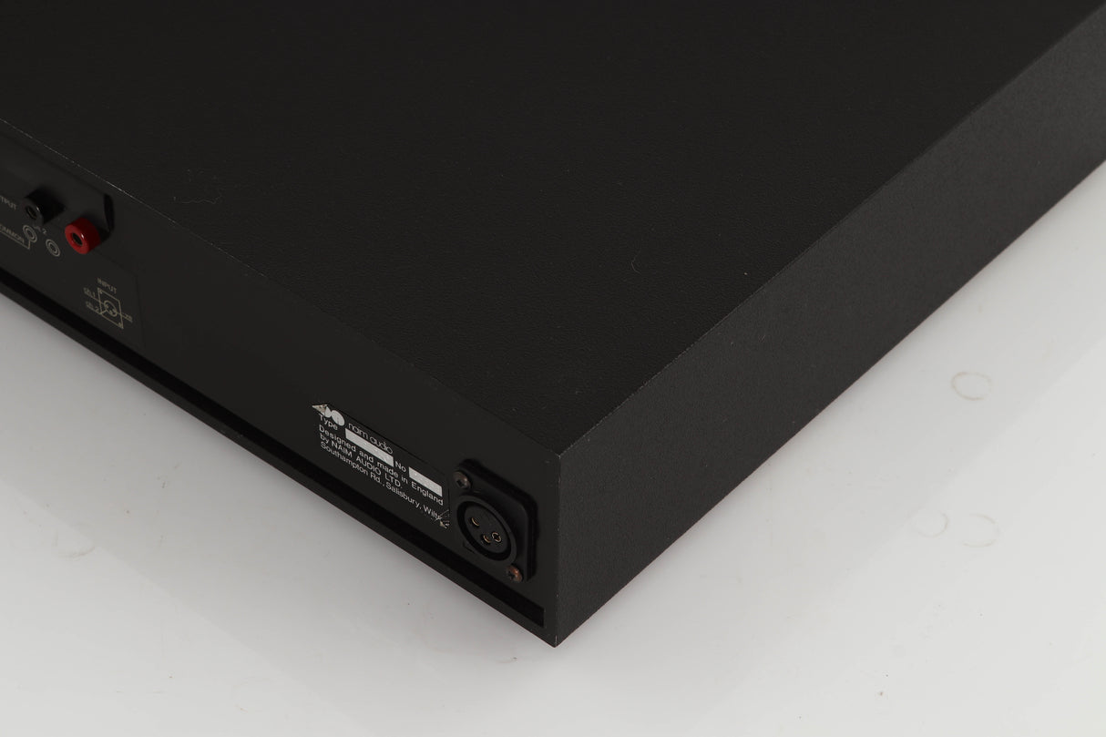 Rear left corner of a used Naim NAP250 Power Amplifier in a black finish