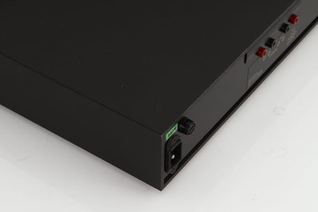 Rear right corner of a used Naim NAP250 Power Amplifier in a black finish