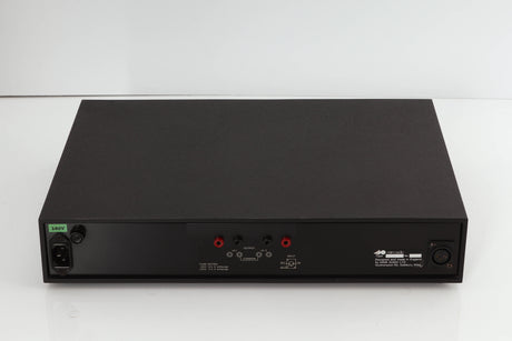 Rear view of a used Naim NAP250 Power Amplifier in a black finish showing Mains Input and Speaker Outputs