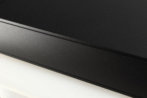 Close up of a used Naim Nait 5si Integrated Amplifier in a black finish showing light scratch on right side