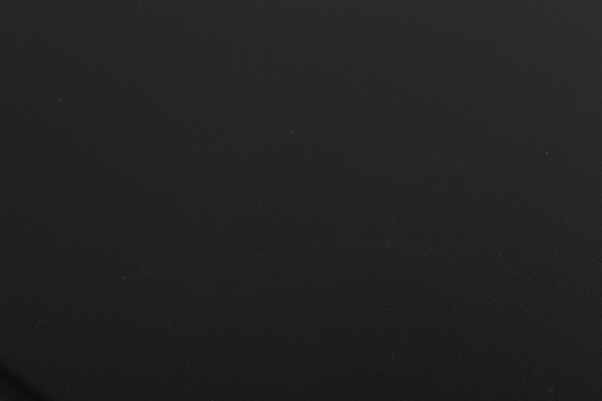 Close up of a used Naim NAT03 FM Tuner in a Black finish showing light scratches on top