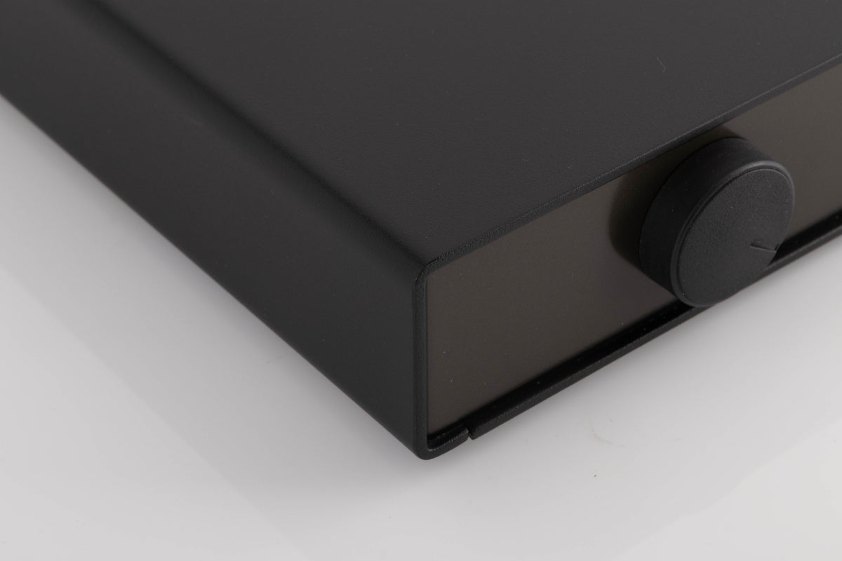 Front left corner of a used Naim NAT03 FM Tuner in a Black finish