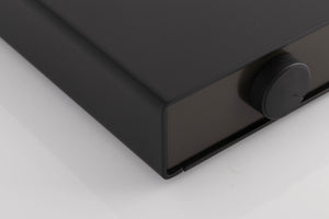 Front left corner of a used Naim NAT03 FM Tuner in a Black finish