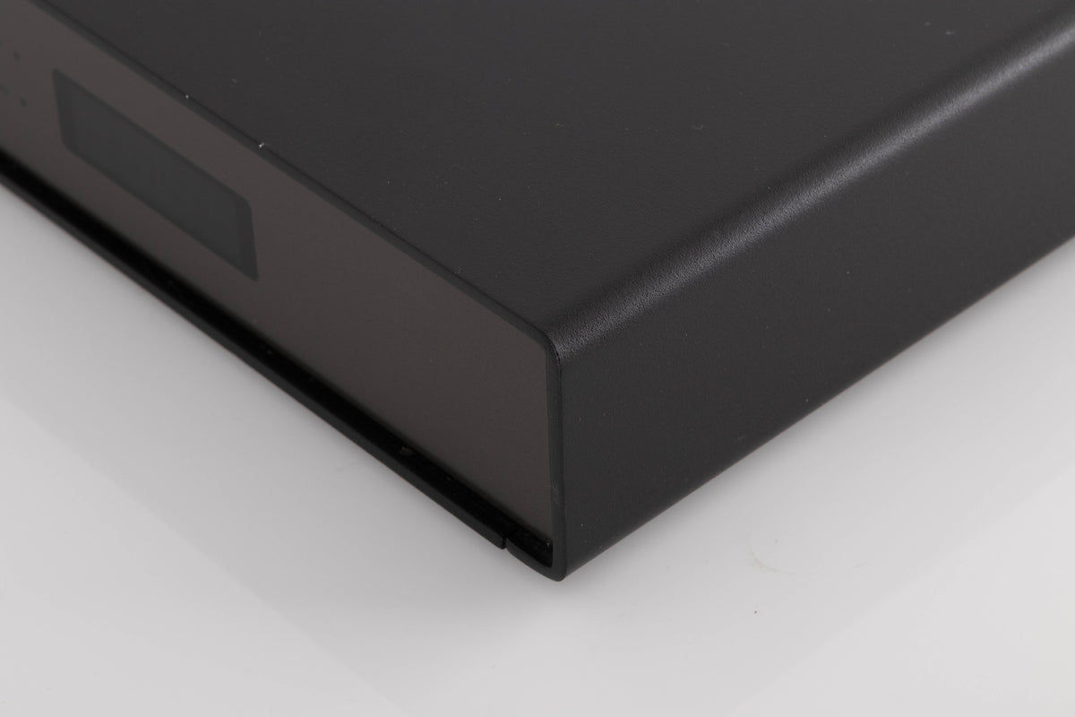 Front right corner of a used Naim NAT03 FM Tuner in a Black finish