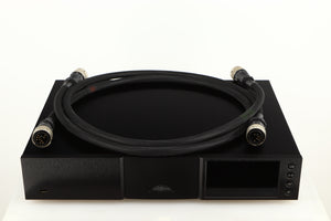 Top of a used Naim ND555 Media Player in a black finish showing 2x Burndy Cables