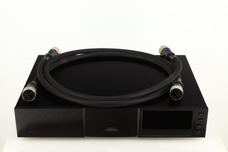 Top of a used Naim ND555 Media Player in a black finish showing 2x Burndy Cables
