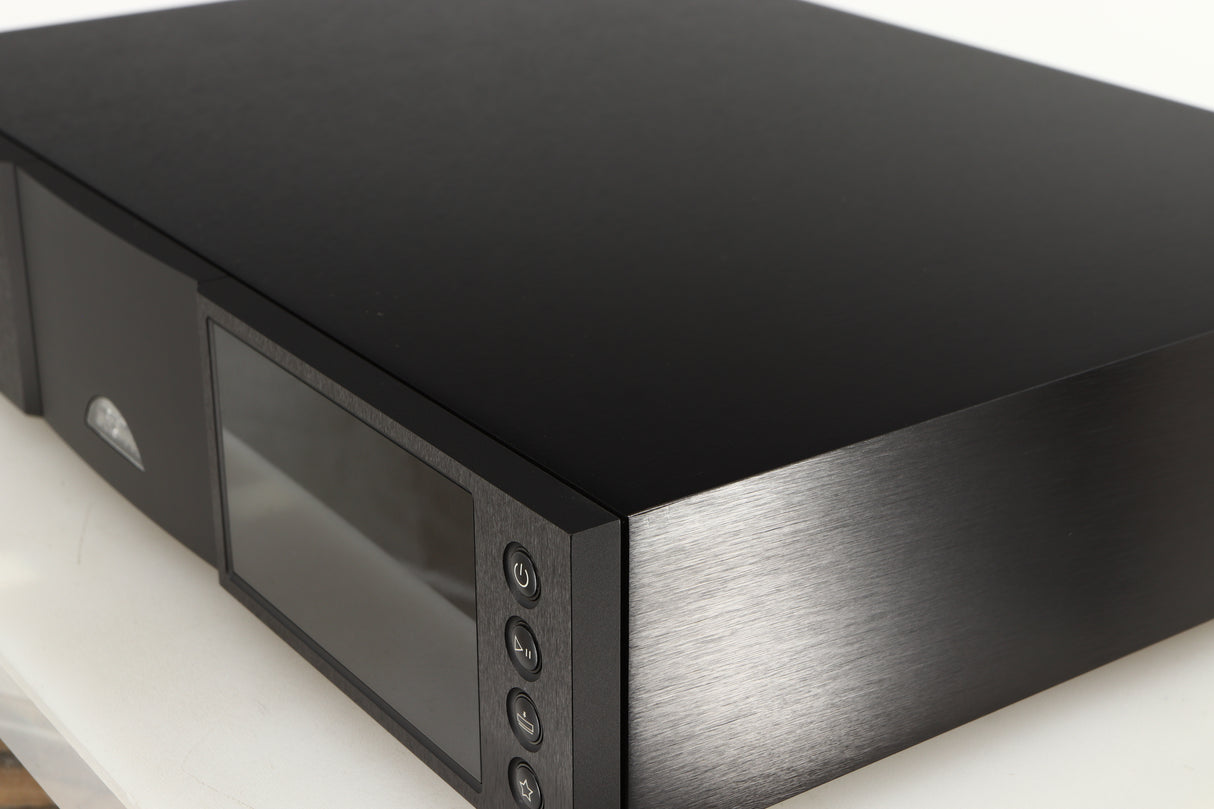 Close up of a used Naim ND555 Media Player in a black finish showing 2 very minor scratches on right side near front right corner 