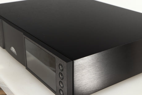 Close up of a used Naim ND555 Media Player in a black finish showing 2 very minor scratches on right side near front right corner 