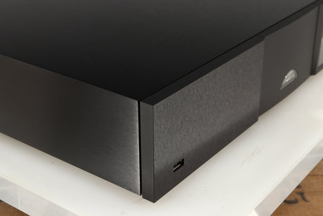 Front left corner of a used Naim ND555 Media Player in a black finish