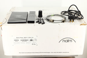 Box of a used Naim NDX 2 Network Streamer with mains cable, manual, remote, SNAIC, 3x antenna, and burndy plug