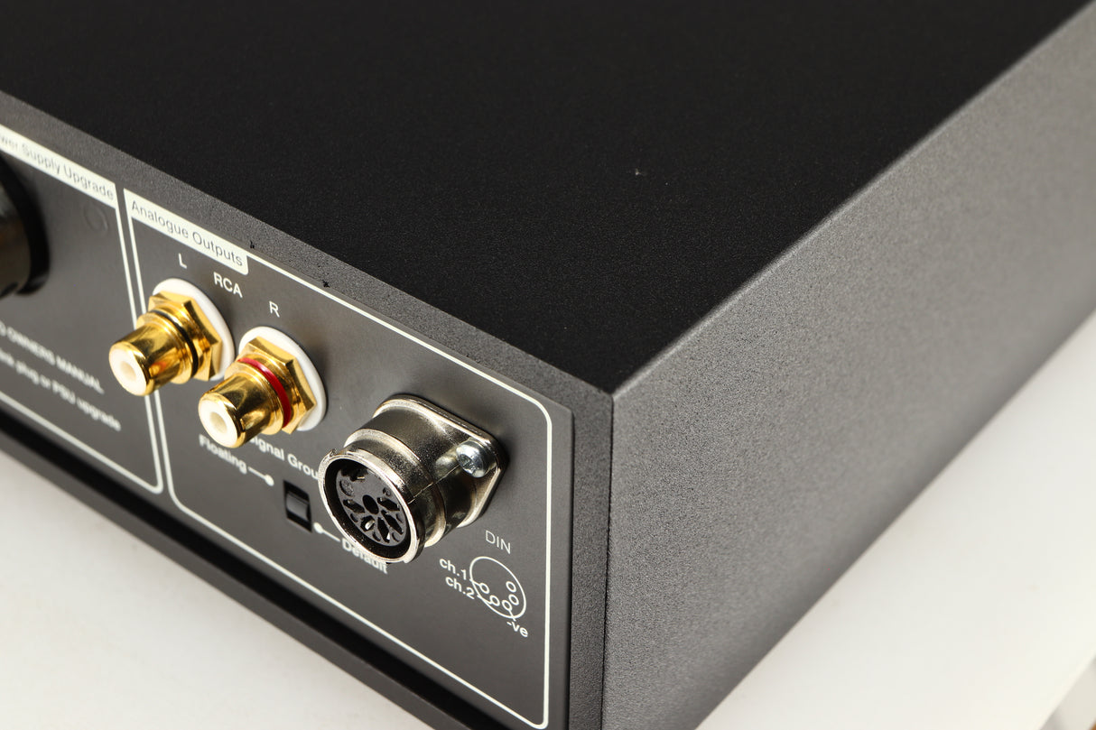 Close up of a used Naim NDX2 Network Streamer in a black finish showing nicks on rear edge