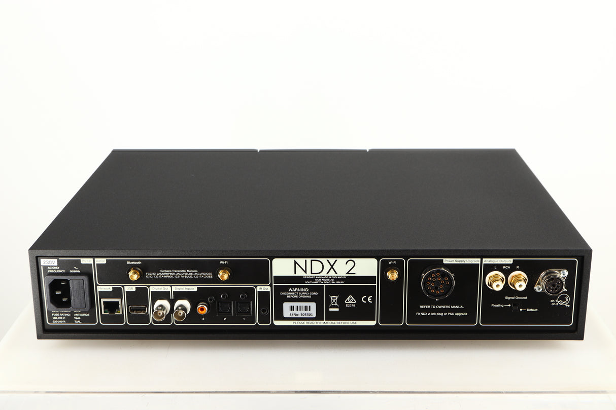 Rear view of a used Naim NDX2 Network Streamer in a black finish showing Mains Input, USB Input, Optical Inputs, Phono Input, Phono Outputs, Network Input and DIN Output