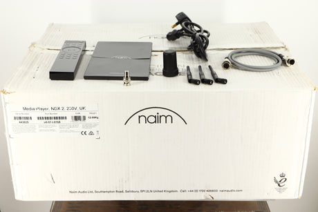 Box of a used Naim NDX2 Network Streamer with Mains Cable , Manual, Remote, SNAIC, BNC Adaptor, 3x Antenna, and Burndy Plug
