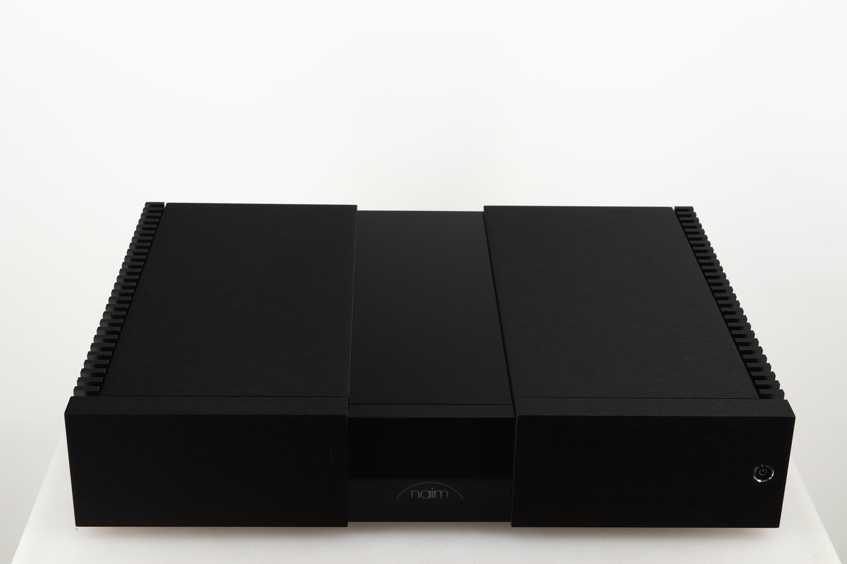 Top of a used Naim NPX300 Power Supply in a black finish