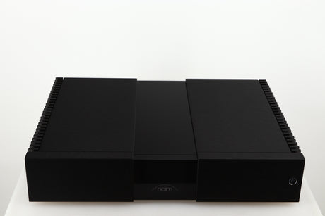 Top of a used Naim NPX300 Power Supply in a black finish