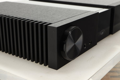 Front left corner of a used Naim NSC 222 Streaming Pre Amplifier in a black finish
