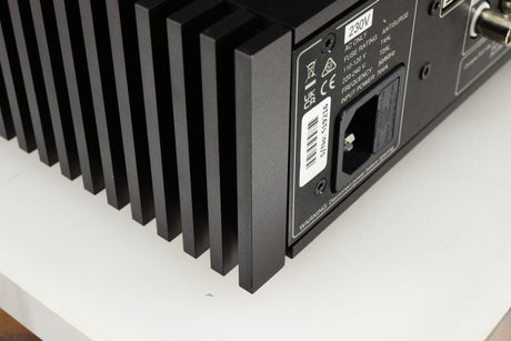 Close up of a used Naim NSC222 Pre Amplifier in a black finish showing small scratch on rear right corner