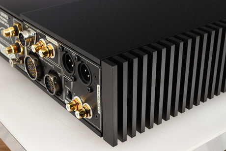 Rear left corner of a used Naim NSC222 Pre Amplifier in a black finish