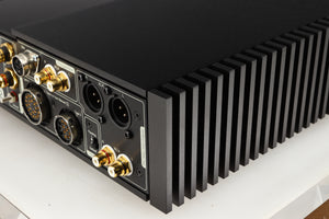 Rear left corner of a used Naim NSC222 Pre Amplifier in a black finish