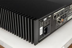 Rear right corner of a used Naim NSC222 Pre Amplifier in a black finish