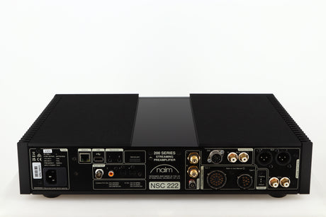 Rear view of a used Naim NSC222 Pre Amplifier in a black finish showing Mains Input, Optical Inputs, USB Input and Analogue Inputs/Outputs