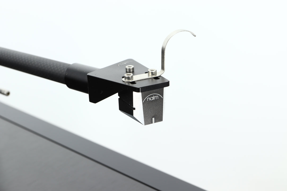 Close up of a used Naim Solstice Special Edition Turntable in a black finish showing the cartridge