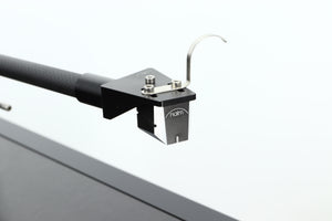 Close up of a used Naim Solstice Special Edition Turntable in a black finish showing the cartridge
