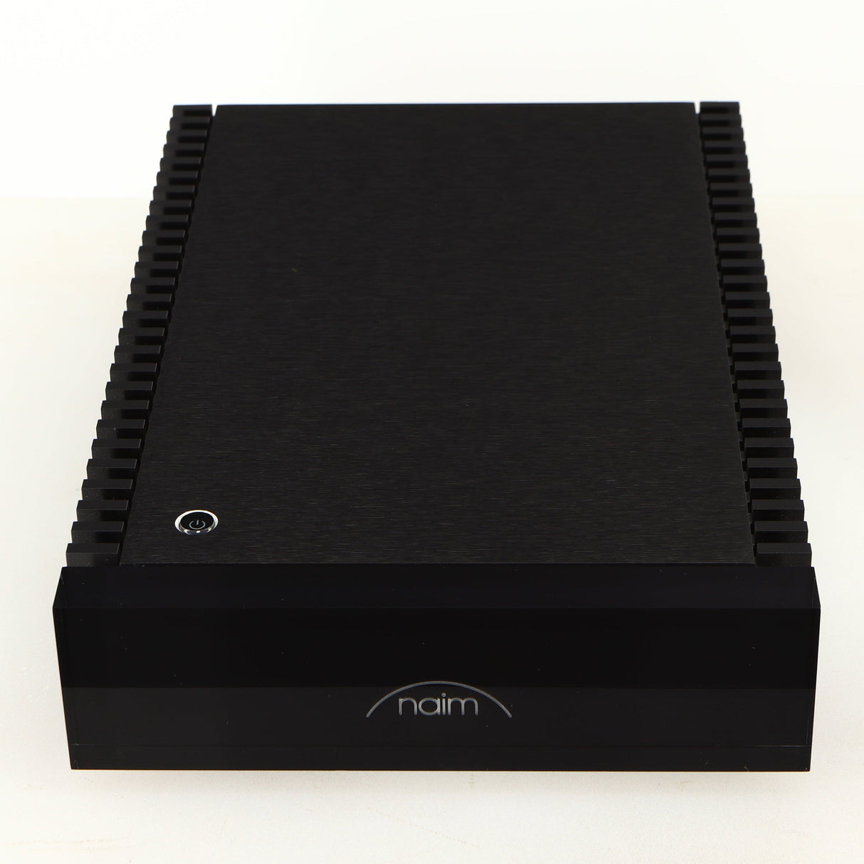 Top of a used Naim NPX TT Power Supply in a black finish