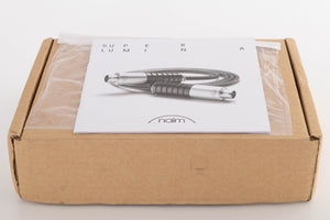 Outer box for a used Naim Super Lumina 4 PIN DIN-XLR 1.0m Interconnect Cable showing Manual
