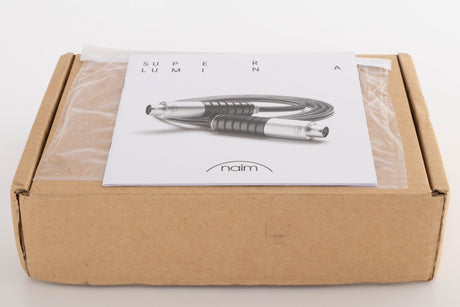Outer box for a used Naim Super Lumina 4 PIN DIN-XLR 1.0m Interconnect Cable showing Manual