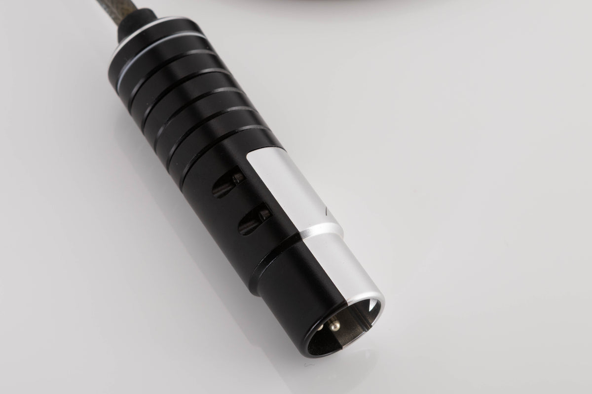 Close up of a used Naim Super Lumina 4 PIN DIN-XLR 1.0m Interconnect Cable showing connector