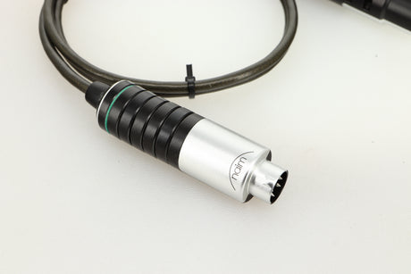 Close up of used Naim Super Lumina 4PIN DIN-XLR Interconnect Cables in a black finish showing connector
