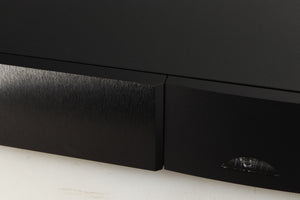 Close up of a used Naim Supercap DR Power Supply in a black finish showing small mark on fascia