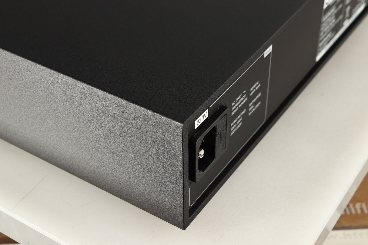 Rear right corner of a used Naim Supercap DR Power Supply in a black finish