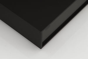 Front left corner of a used Naim Supercap Power Supply in a black finish