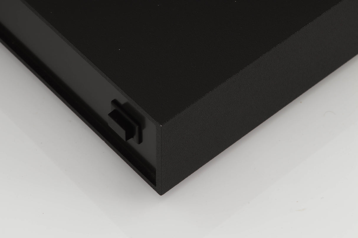 Front right corner of a used Naim Supercap Power Supply in a black finish