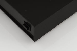 Front right corner of a used Naim Supercap Power Supply in a black finish