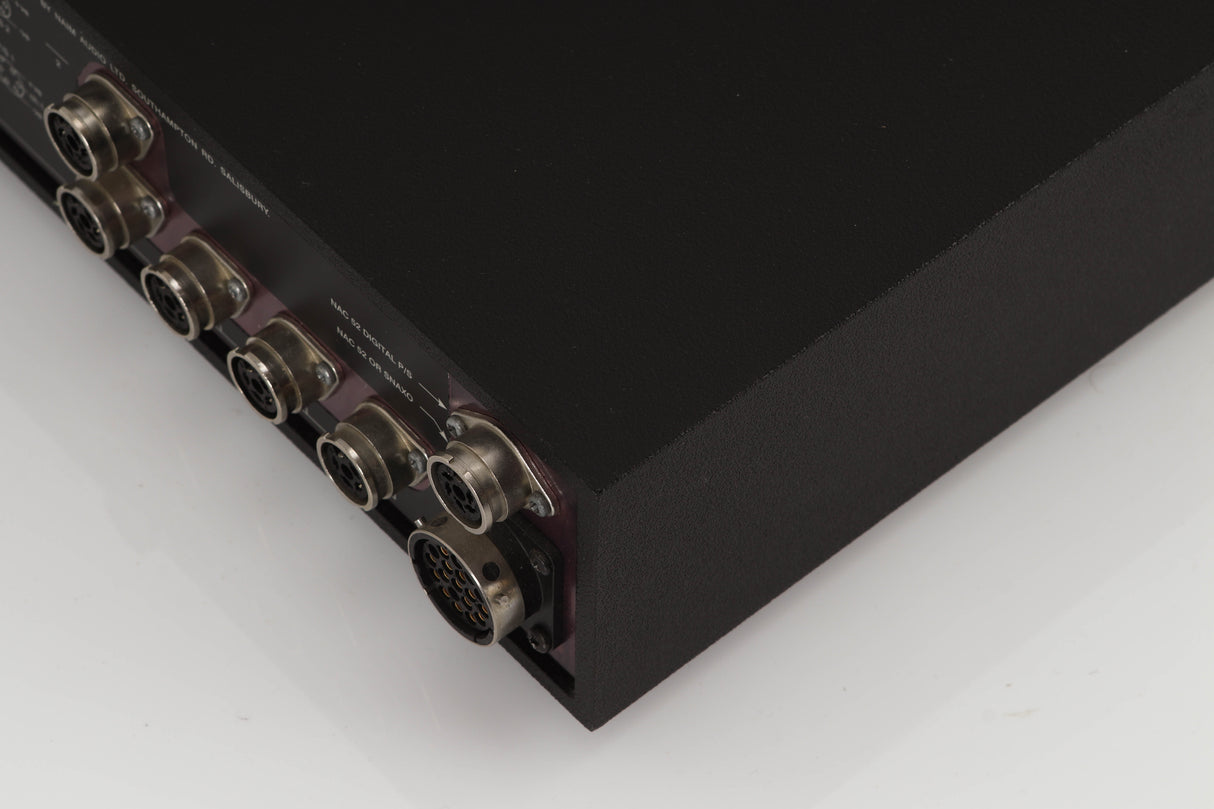 Rear left corner of a used Naim Supercap Power Supply in a black finish