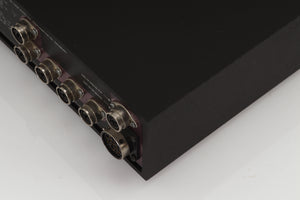 Rear left corner of a used Naim Supercap Power Supply in a black finish
