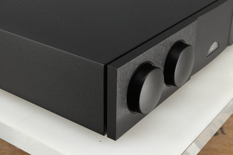 Front left corner of a used Naim Supernait 2 Integrated Amplifier in a black finish