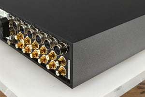 Rear left corner of a used Naim Supernait 2 Integrated Amplifier in a black finish